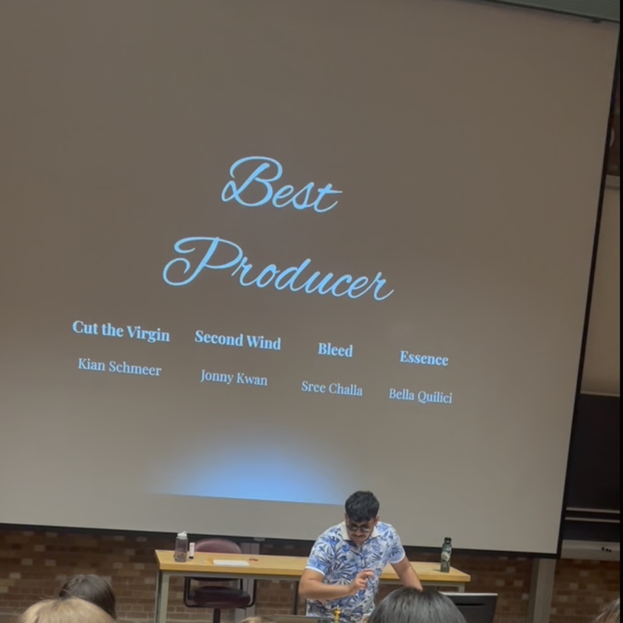 Best Producer nominees projected in an auditorium, including Bleed and Sree Challa